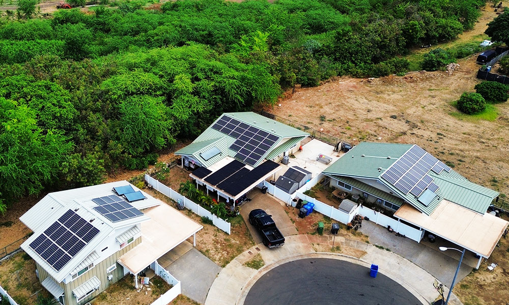 Go Local Powur residential solar installations in a Hawaii neighborhood, promoting sustainable energy for homes.